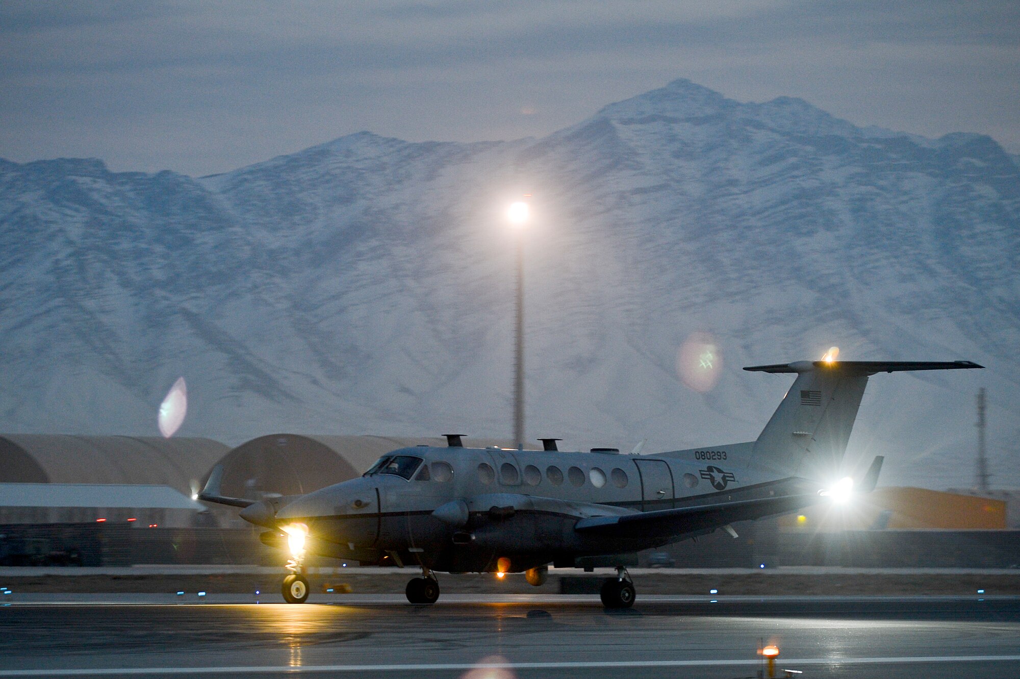 An MC-12W Liberty returns from a mission at Bagram Airfield, Afghanistan, Feb. 11, 2014. The MC-12 provides tactical intelligence, surveillance and reconnaissance for U.S. forces in Afghanistan. (U.S. Air Force photo by Senior Airman Kayla Newman/Released)