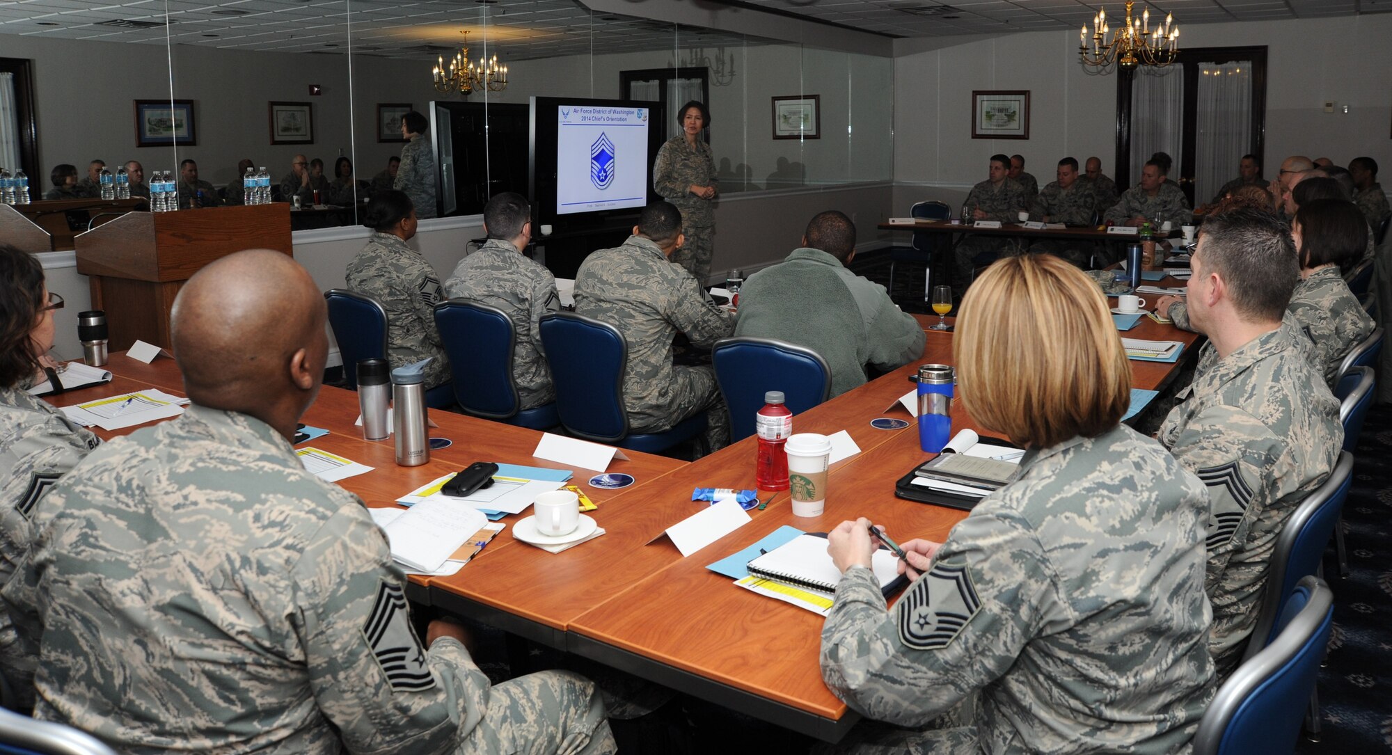 Air Force District of Washington Commander Maj. Gen. Sharon K. G. Dunbar discusses the weight a chief stripe carries to a group of chief master sergeant selects and newly promoted chief master sergeants during the Chief Orientation Seminar at Joint Base Anacostia-Bolling, D.C., Feb. 7, 2014. During the seminar several Air Force leaders addressed topics ranging from civilian personnel to being a resilient leader.  (U.S. Air Force photo/Master Sgt. Tammie Moore)