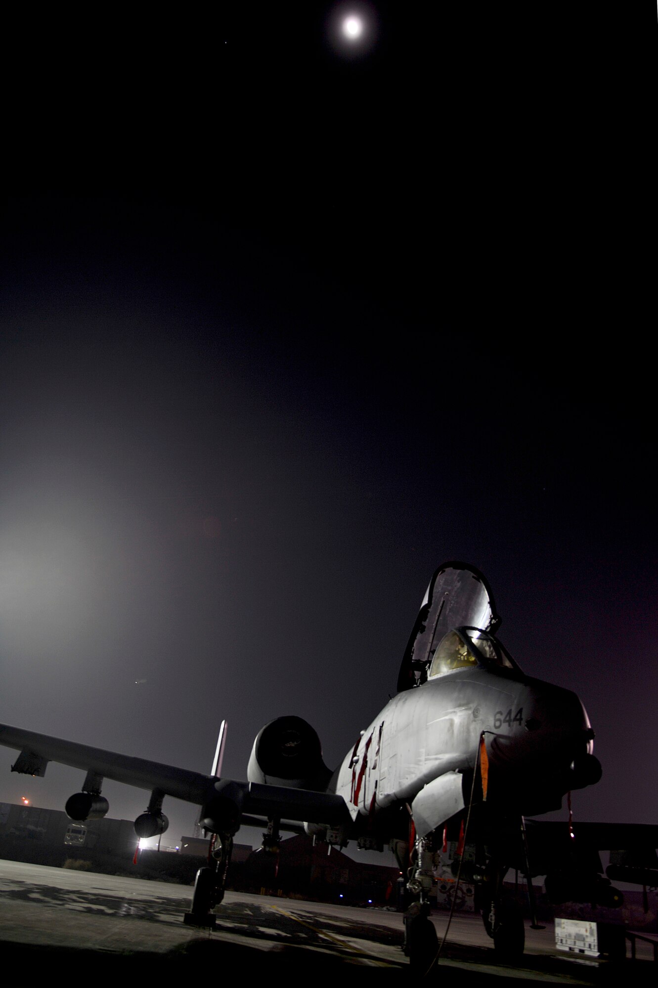 An A-10 Thunderbolt II awaits a weapons reload at Bagram Airfield, Afghanistan, Feb. 10, 2014. Airmen deployed from Moody Air Force Base, Ga., performed the weapons reload.  (U.S. Air Force photo by Senior Airman Kayla Newman/Released)