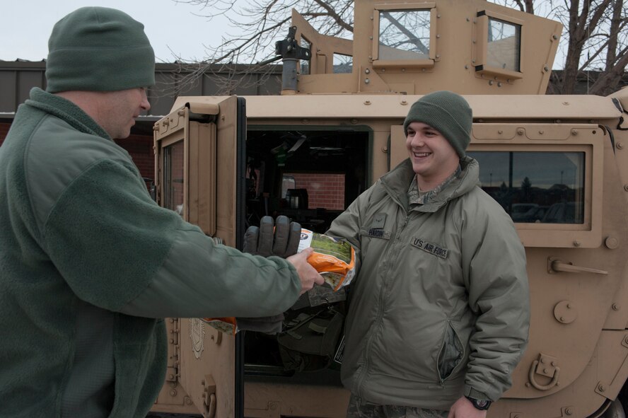Operation Home Front teamed up with The Boy Scouts of America January 16, 2014 to donate over 50 pallets of gourmet popcorn.  Minot Air Force Base First Sergeants delivered popcorn to approximately 36 base organizations, helping to warm the hearts and increase the morale of over 12,000 active duty, Air National Guard, and their families.  Many thanks from the men and women across the 5th Bomb Wing, 91st Missile Wing, and 219th Security Forces Squadron ANG. (U.S. Air Force photos/Public Affairs Office)