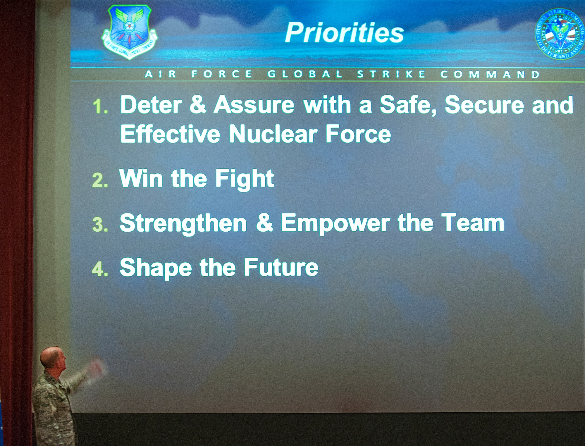 140211-F-JW079-135
Lt. Gen. Stephen Wilson, commander of Air Force Global Strike Command, gestures towards a PowerPoint slide listing his priorities during an all call for the Airmen of the 20th Air Force and the 90th Missile Wing on F.E. Warren Air Force Base, Wyo., Feb. 11, 2014. (U.S. Air Force photo by R.J. Oriez)

