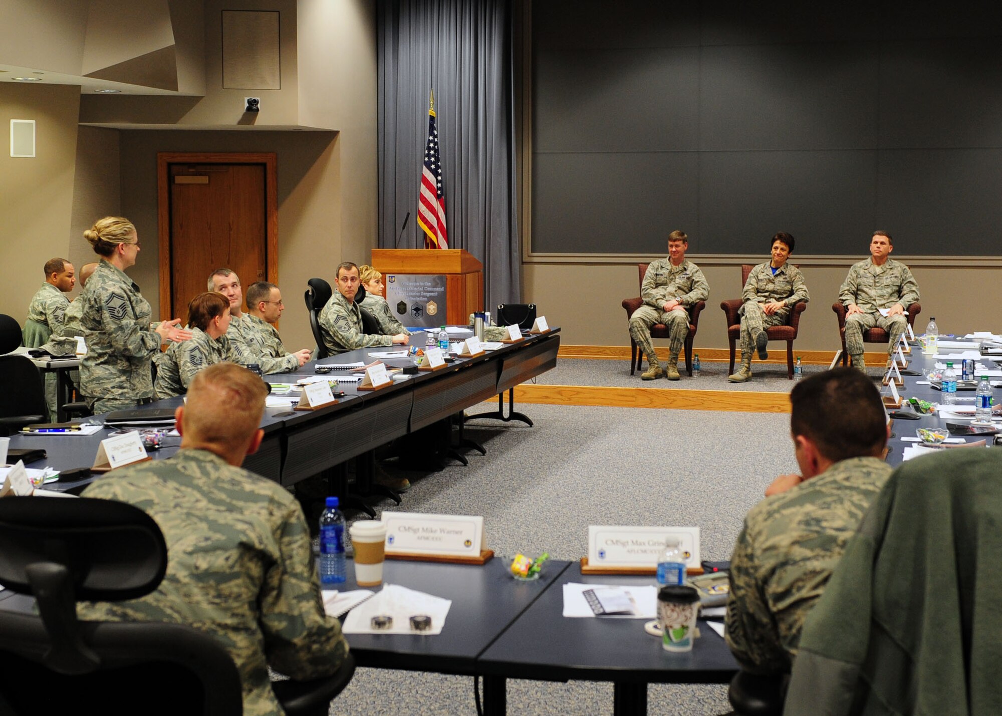 Brig. Gen. William Thornton, Air Force Materiel Command director of Air, Space and Information Operations; Col. Cassie Barlow, 88th Air Base Wing commander; and Col. Steven Bleymaier, Air Force Materiel Command deputy director of logistics, answer questions at the Wing Commander Panel during the 2014 AFMC Chiefs' Orientation. (U.S. Air Force photo/Senior Airman James Jacobs)