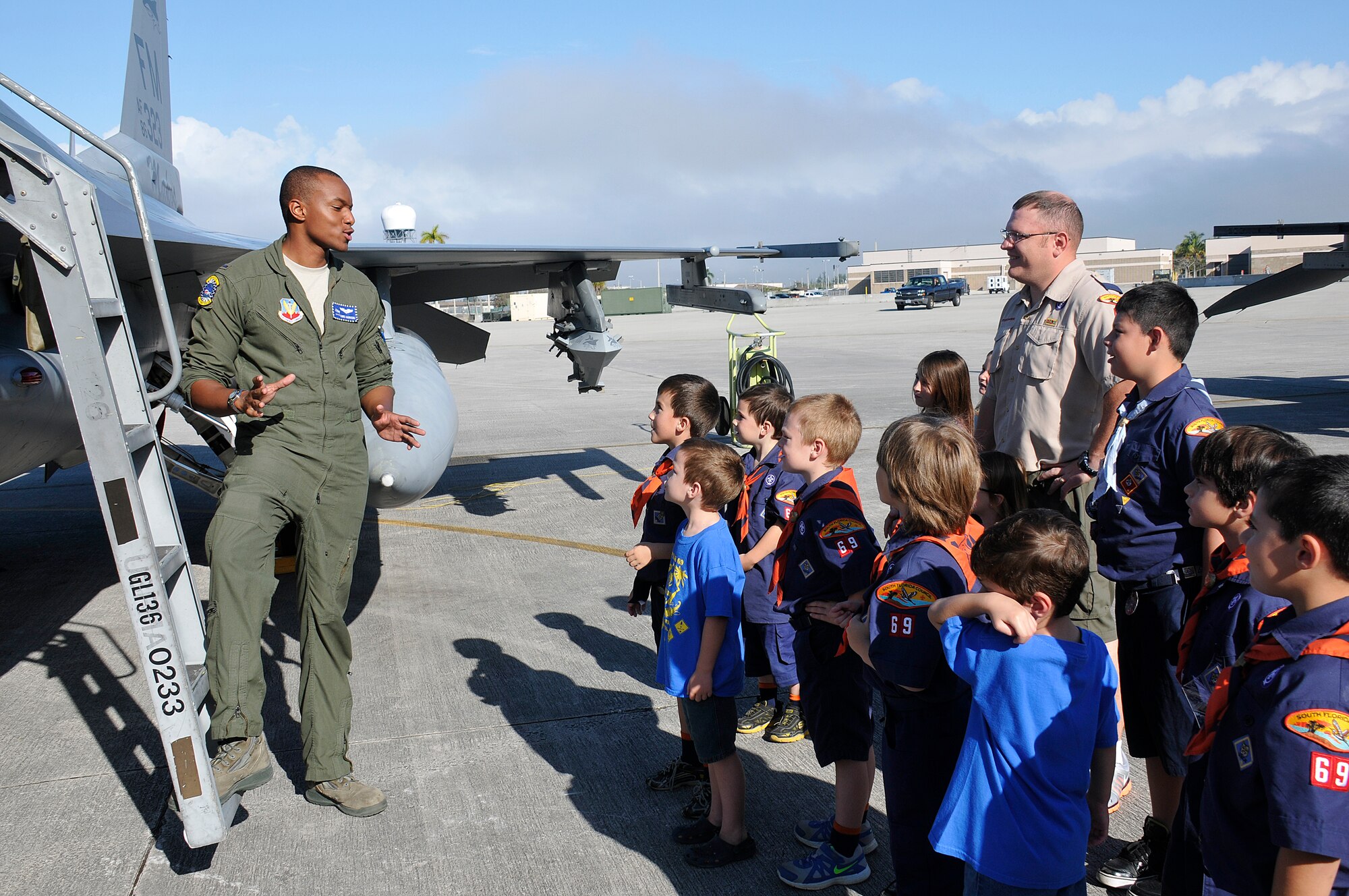 First lieutenant Chris Harrison an F-16 pilot assigned to the 93rd Fighter Squadron, Homestead Air Reserve Base, Fla., talks to Tiger Cub Scouts from Pack 69, Homestead Fla., during a base tour on Jan. 29. (U.S. Air Force photo/Tim Norton)