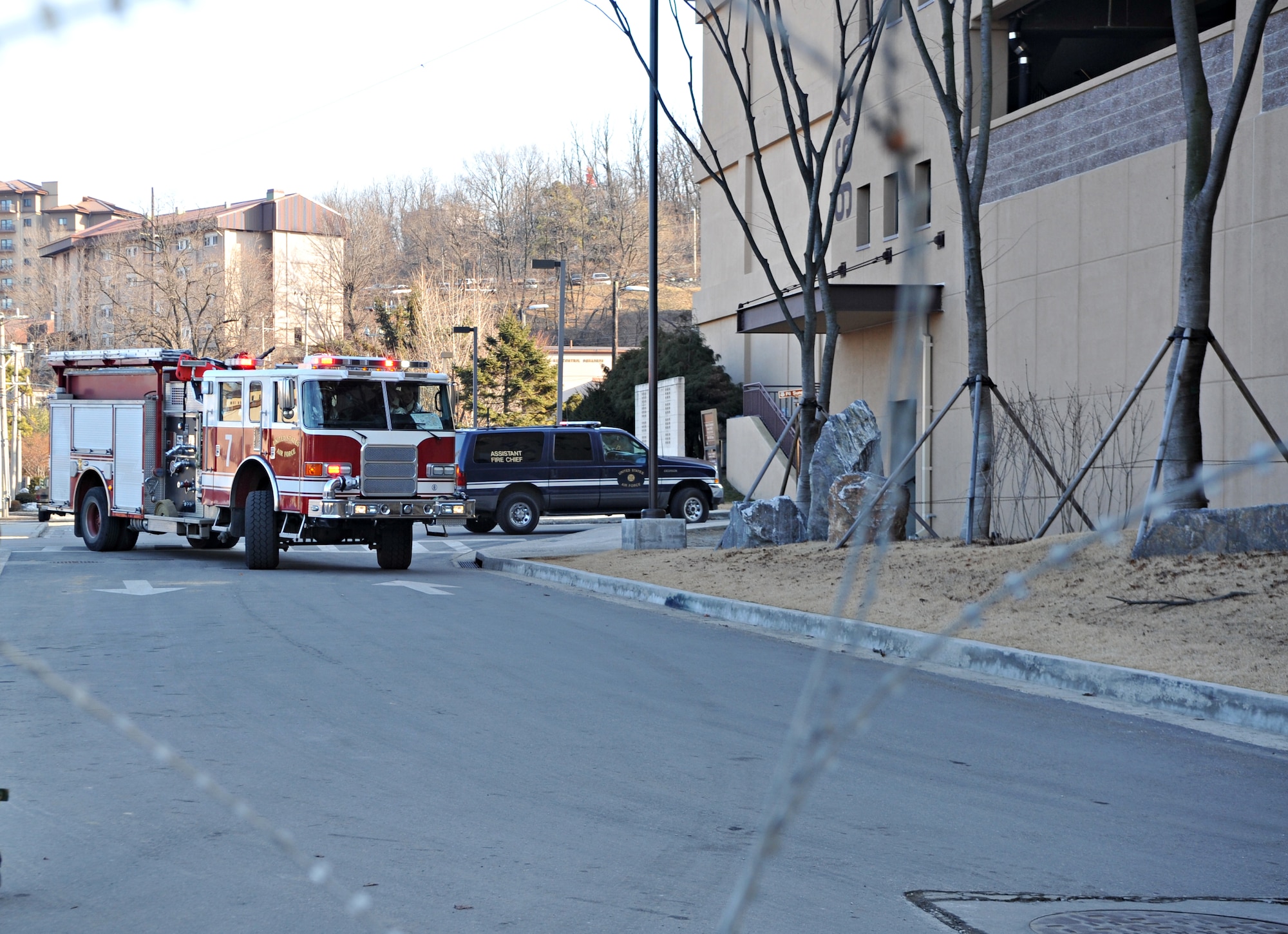 A 51st Civil Engineer Squadron Fire Department fire engine arrives at Bldg. 949 as part of a structure fire and bug-out scenario during Operational Readiness Exercise Beverly Midnight 14-02 at Osan Air Base, Republic of Korea, Feb. 11, 2014. Firefighters were called to extinguish several simulated small fires in the building’s first floor. (U.S. Air Force photo/Airman 1st Class Ashley J. Thum)