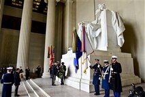 Army Maj. Gen. Jeffrey S. Buchanan, center left, commanding general Joint Force Headquarters National Capitol Region and U.S. Army Military District of Washington, places a wreath at the Lincoln Memorial to mark President Lincoln's Birthday in Washington, D.C., Feb. 12, 2014.