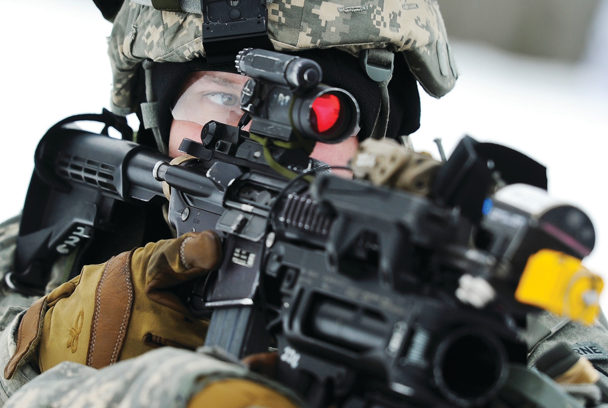 Pfc. Kevin Jones, assigned to Blackfoot Company, 1st Battalion (Airborne), 501st Infantry Regiment, a native of Chicago, provides security during a winter field training exercise, Feb. 3, on JBER. (U.S. Air Force photo/Justin Connaher)