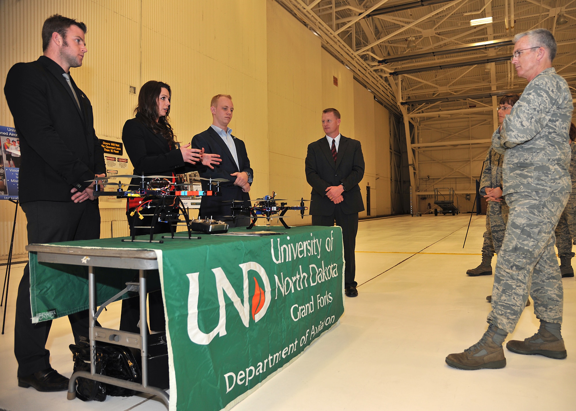 Students from University of North Dakota Grand Forks’ Department of Aviation brief Gen. Paul Selva, Air Mobility Command commander, on what they experience during their schooling during an innovation expo on Feb. 12, 2014, on Grand Forks Air Force Base, N.D. (U.S. Air Force photo/Senior Airman Xavier Navarro)