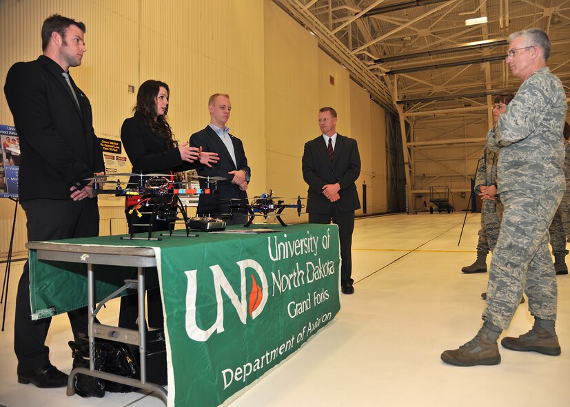 Students from University of North Dakota Grand Forks’ Department of Aviation brief Gen. Paul Selva, Air Mobility Command commander, on what they experience during their schooling during an innovation expo on Feb. 12, 2014, on Grand Forks Air Force Base, N.D. (U.S. Air Force photo/Senior Airman Xavier Navarro)
