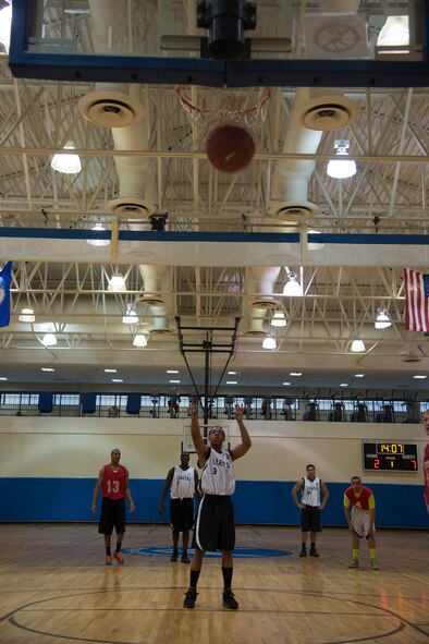 U.S. Air Force Airman 1st Class Dontavius Strother, 23d Equipment Maintenance Squadron, shoots a free-throw during an intramural basketball game at Moody Air Force Base, Ga., Feb. 12, 2014. A personal foul was given to 723d AMXS for an incorrect block from a defensive player. (U.S. Air Force photo by Airman Dillian Bamman/Released)