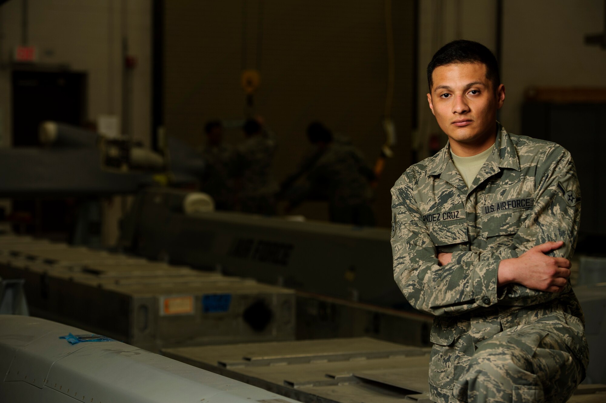 Airman Dennis Mendez Cruz, 576th Flight Test Squadron missile maintenance team member, poses for a photo during AGM-86B Air-Launched Cruise Missile maintenance training at Vandenberg Air Force Base, Calif., Feb. 4, 2014. ALCM maintenance teams perform periodic inspections, troubleshoot and repair electrical systems on weapon support equipment, missile guidance and control system components. (U.S. Air Force photo by Staff Sgt. Jonathan Snyder/RELEASED)

