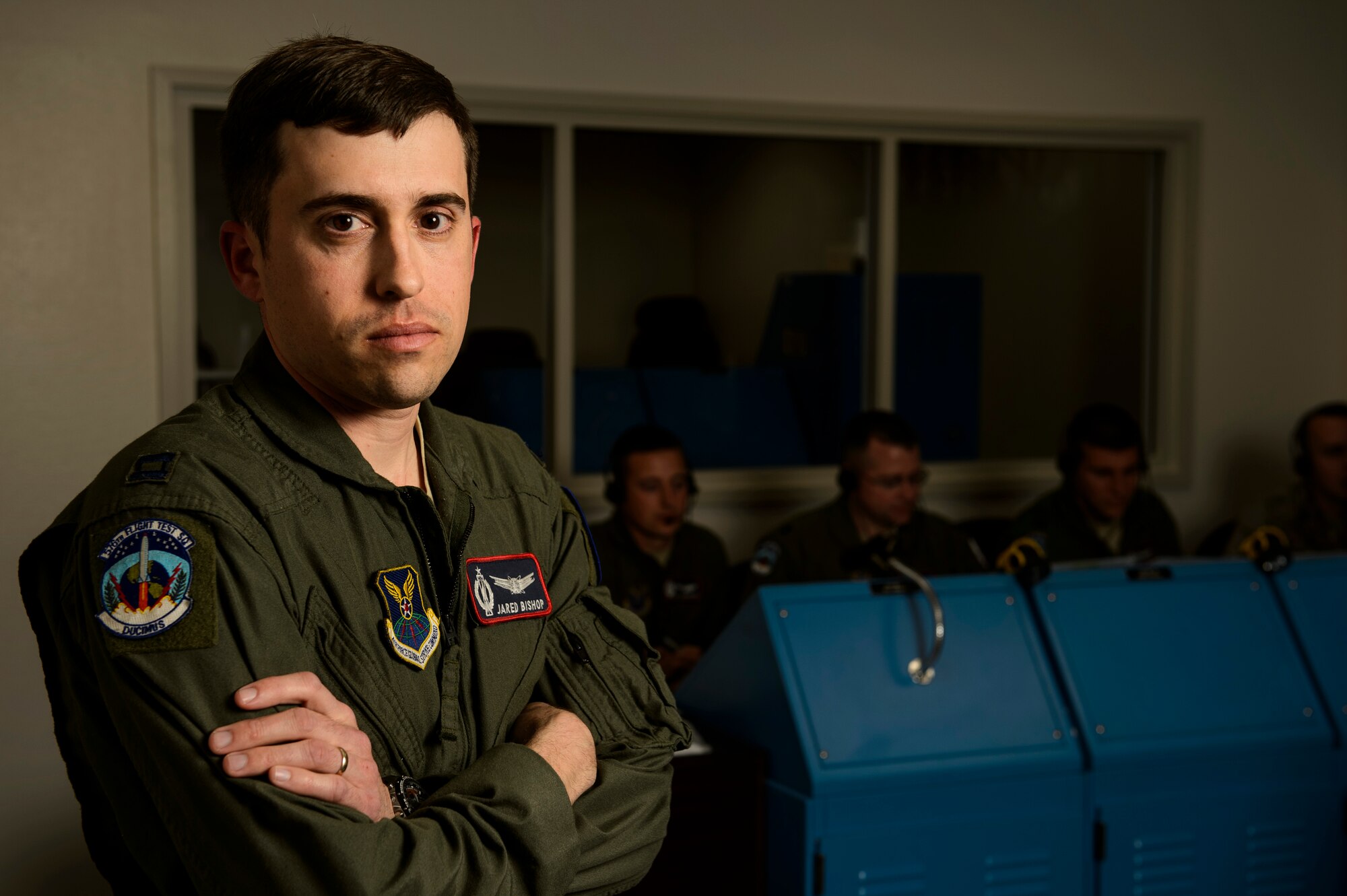 Capt. Jared Bishop, 576th Flight Test Squadron missileer, poses for a photo in a launch control center at Vandenberg Air Force Base, Calif., Feb. 3, 2014. The 576th FLTS is America's only Intercontinental Ballistic Missile training and testing squadron that conducts an average of 3-4 test launches each year. (U.S. Air Force photo by Staff Sgt. Jonathan Snyder/RELEASED)