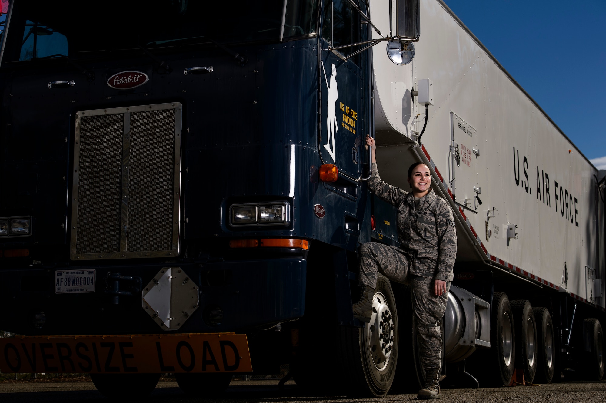 Staff Sgt. Cami Withers, 576th Flight Test Squadron facilities maintenance instructor, poses for a photo in front of an Intercontinental Ballistic Missile Transporter-Erector-Loader at Vandenberg Air Force Base, Calif., Feb. 3, 2014. Minuteman IIIs are regularly tested with launches from Vandenberg AFB to validate the effectiveness, readiness and accuracy of the weapon system as well as to support the system's primary purpose - nuclear deterrence. (U.S. Air Force photo by Staff Sgt. Jonathan Snyder/RELEASED)
