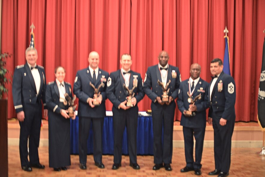 The 433rd Airlift Wing 2014 Annual Award Winners finalists were: 
(From left) Company Grade Officer of the Year: Capt. Kimberly Bryant, 433rd Maintenance Squadron; Noncommissioned Officer of the Year, Tech. Sgt. James Grove, Jr., 733rd Training Squadron; Senior Noncommissioned Officer of the Year, Senior Master Sgt. Marc Gibson, 733rd Training Squadron; First Sergeant of the Year, Senior Master Sgt. Eric Smith, 433rd Security Forces Squadron;  Airman of the Year, Senior Airman Lionel Mills, II, 433rd Security Forces Squadron.
(Not Shown) Civilian Winners: Category I, Darren Pierce, 433rd Aerospace Medicine Squadron; Category II, Jason Peck, 433rd Airlift Wing, Craig Arnold, 433rd Airlift Wing