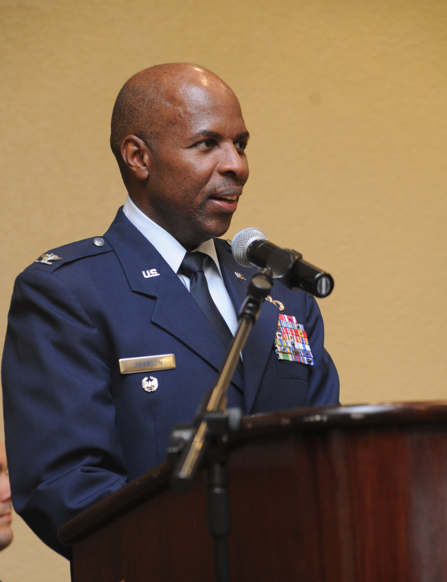 Col. Malcolm Johnson, 2nd Air Force vice commander, speaks during the National Prayer Luncheon Feb. 12, 2014, at the Bay Breeze Event Center, Keesler Air Force Base, Miss.  The annual event, a tradition that stems back to President Dwight D. Eisenhower in 1953, allows individuals of different faiths and backgrounds to join together to reflect and develop their spiritual fitness. This year’s theme was “One Voice, United in Prayer.”  (U.S. Air Force photo by Kemberly Groue)