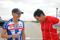 Tim Hansen (left) congratulates Louis Hernandez after finishing the Run-Bike-Run
event Feb. 1 at Joint Base San Antonio-Randolph. (U.S. Air Force photo by Airman 1st Class Kenna Jackson)