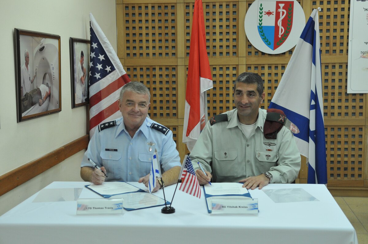 The Air Force Surgeon General, Lt. Gen. (Dr.) Thomas Travis and his counterpart in the Israeli Defense Force, Brig. Gen.  (Dr.) Yitshak  Kreiss, signed an agreement Feb. 5 in Israel to reaffirm their mutual commitment to collaboration between the Air Force Medical Service and the IDF Medical Corps.