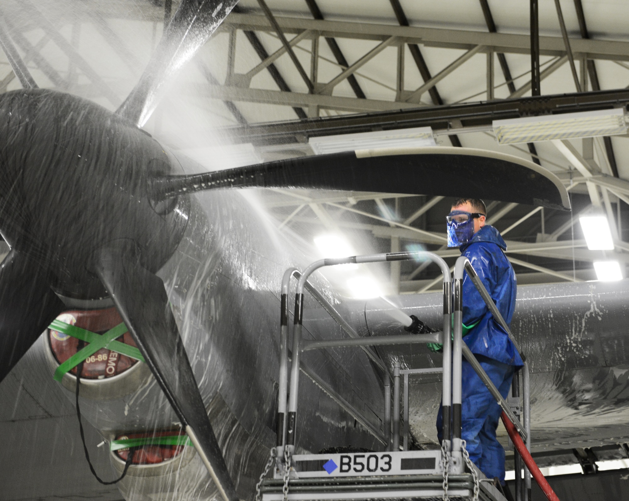 Airman 1st Class Enoch Wentland, 86th Maintenance Squadron crew chief, scrubs the engine of a C-130J Super Hercules, Feb. 10, 2014, Ramstein Air Base, Germany. Airman of the 86th MXS and the 86 Aircraft Maintenance Squadron work daily to keep the aircraft mobile and in working condition. (U.S. Air Force photo/Airman Dymekre Allen)