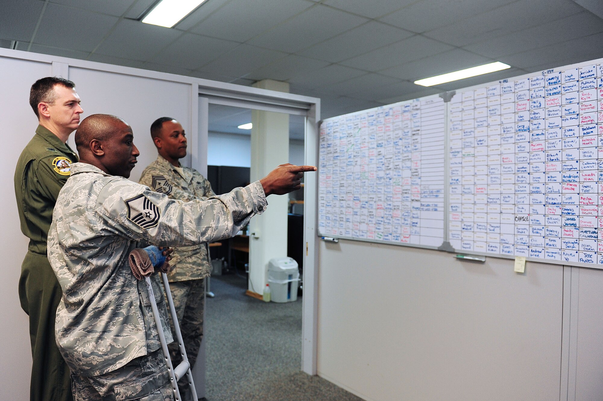 Master Sgt. Travis Smalls 39th Civil Engineer Squadron unaccompanied housing superintendent, explains the dormitory layout to Col. Craig Wills, 39th Air Base Wing commander and Chief Master Sgt. Anthony Johnson, 39th ABW command chief Feb. 13, 2014, at Incirlik Air Base, Turkey.  The unaccompanied housing office oversees living accommodations for over 800 individuals stationed here. (U.S. Air Force photo by Airman 1st Class Nicole Sikorski/Released) 