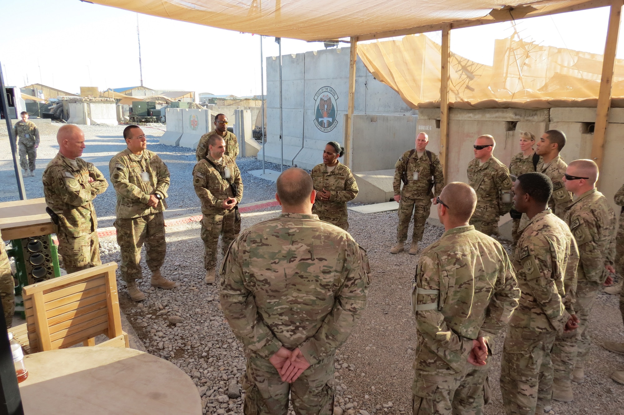Air Force Central Command’s Command Chief Master Sgt. Shelina Frey talks to Airmen at the 73rd Expeditionary Air Control Squadron at Kandahar Airfield, Afghanistan, Feb. 12, 2014. Frey is touring bases in Afghanistan talking to Airmen and answering questions.(U.S. Air Force photo by Staff Sgt. Joseph Needham/Released)
