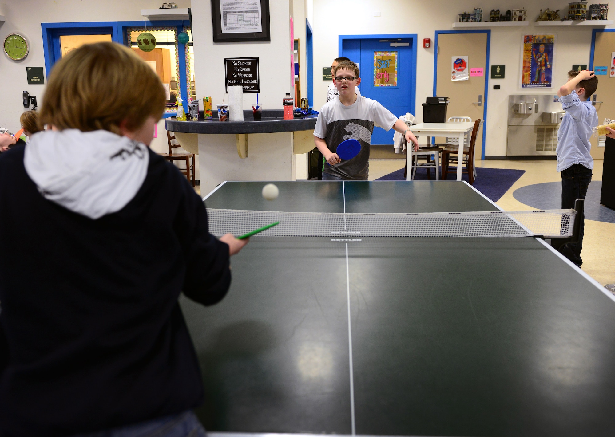 Owen Pogany, Son of Master Sgt. Michael Pogany, plays a game of table tennis at the Aviano Youth Programs’ Open Recreation and Teen Center, Feb. 11, 2014, at Aviano Air Base, Italy. The center recently made changes to offer children an improved before-and-after-school program. (U.S. Air Force photo/Senior Airman Matthew Lotz)