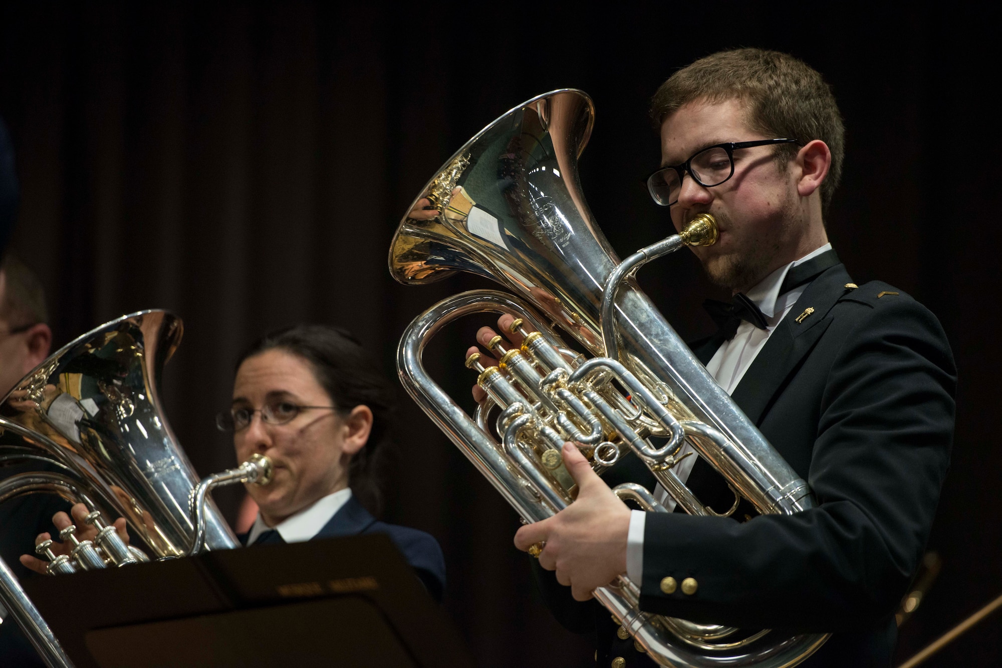 Luxembourg Air Force Sgt. Marc Mollitor, a Luxembourg Musique Militaire euphonium player, performs during a joint concert with the U.S. Air Forces in Europe Band brass ensemble Feb. 11, 2014, at the Mehrzweckhalle in Kenn, Germany.  The Mission of the U.S. Air Force bands is to support the global Air Force mission in war and peace by preserving national heritage providing professional musical products and services for official military, recruiting and community relations events. (U.S. Air Force photo by Staff Sgt. Christopher Ruano/Released)
