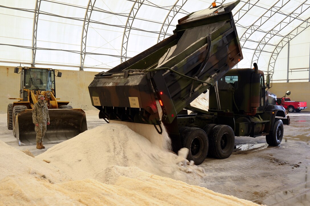 Thirty South Carolina Army National guard dump truck crews support hauling operations in response to a request by the S.C. Department of Transportation to transport 600 tons of road salt from the Charleston sea salt plant to Columbia, following  the ice storm that impacted the state Feb 11-13, 2014.  More than 180 soldiers were put on state active duty to respond to the winter storm following the declaration of state of emergency by S.C. Gov. Nikki Haley, Feb. 11, 2014.