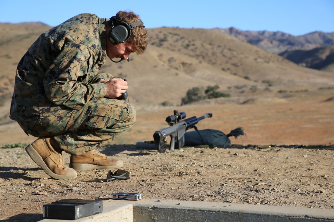 Sgt. Michael Currier, a scout with Company A, 1st Reconnaissance Battalion, 1st Marine Division, tracks the shot adjustments for his .50 caliber rifle at a range of 1,150 meters. I Marine Expeditionary Force, Special Operations Training Group, Special Missions Branch conducted a training event for scouts from 1st Reconnaissance Battalion aboard Camp Pendleton, Calif., Feb 12.