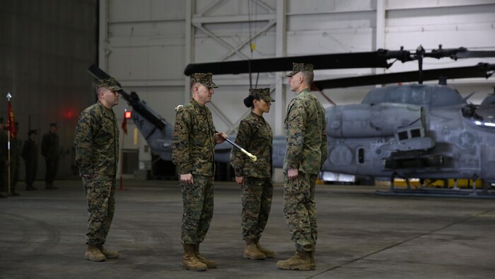 Sgt. Maj. Lynnette C. Marr-Gaye relieves Sgt. Maj. Marion L. Hammerschmidt Jr., as the Marine Light Attack Helicopter Squadron 269 sergeant major in a ceremony at the squadron's hangar, Feb. 13.
