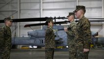 Sgt. Maj. Lynnette C. Marr-Gaye relieves Sgt. Maj. Marion L. Hammerschmidt Jr., as the Marine Light Attack Helicopter Squadron 269 sergeant major in a ceremony at the squadron's hangar, Feb. 13.