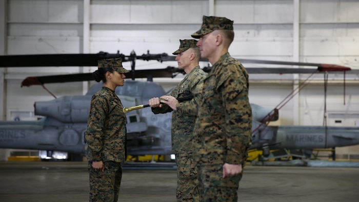 Sgt. Maj. Lynnette C. Marr-Gaye relieves Sgt. Maj. Marion L. Hammerschmidt Jr., as the Marine Light Attack Helicopter Squadron 269 sergeant major in a ceremony at the squadron's hangar, Feb. 13.
