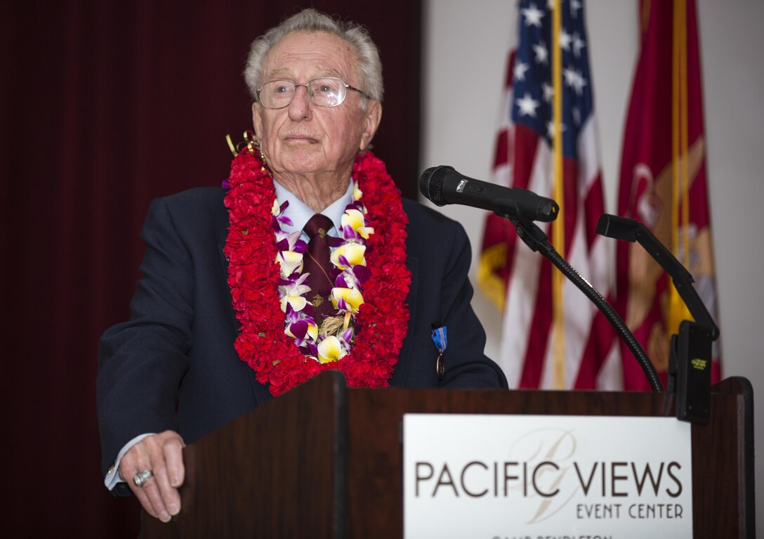 Walter Valentine speaks at his retirement ceremony at the Pacific Views event center on Feb. 14. Val has been serving the Marine Corps for 64 years, first on active duty climbing through the enlisted ranks and then on the civilian side helping Marines and sailors transition back into the civilian world. 

Val closed with “To the love of my life, I couldn’t have done it without you, your love and your support. You brought up six wonderful children while I was gone to war, maneuvers and TAD. I’m going to miss going up to my office, looking out the window and seeing people come to work, seeing the sun rise and listening to colors. That truly will be missed. People ask what I will be doing now, well I will let time take its course, walk my one mile a day and if it comes down to it, I will fire my gardeners and take over the yard.” 

Valentine retired on Camp Pendleton as a Sergeant Major in 1973 and then spent the next four decades with Marine Corps Community Services retiring Feb. 14, 2014. 
