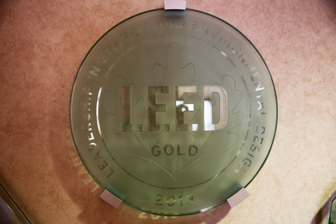 The Leadership in Energy and Environmental Design Gold plaque sits on the lobby wall at the Miramar Inn aboard Marine Corps Air Station Miramar, Calif., Feb. 13. The LEED certificate identifies establishments that have met certain environmental and energy conservational standards.
