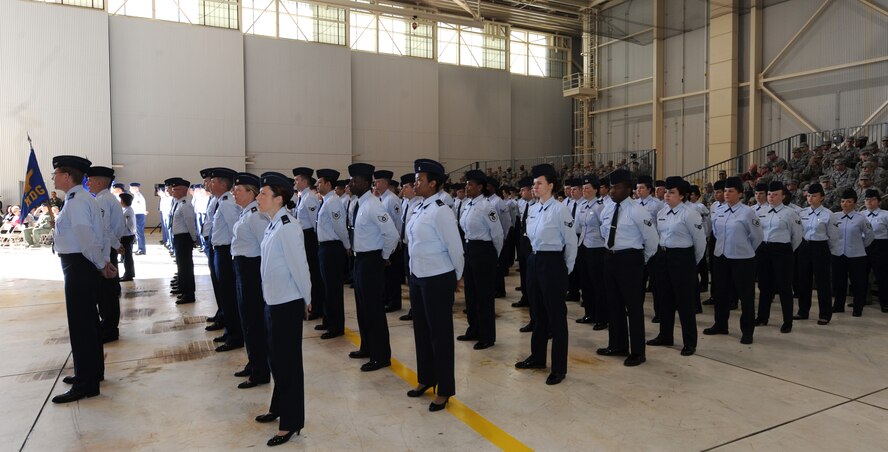 Airmen from the 7th Bomb Wing stand in formation during a change of command ceremony Feb. 14, 2014, at Dyess Air Force Base, Texas. Col. Michael Bob Starr, 7th Bomb Wing commander, inspected his new wing after accepting command. (U.S. Air Force photo by Airman 1st Class Kedesha Pennant)
