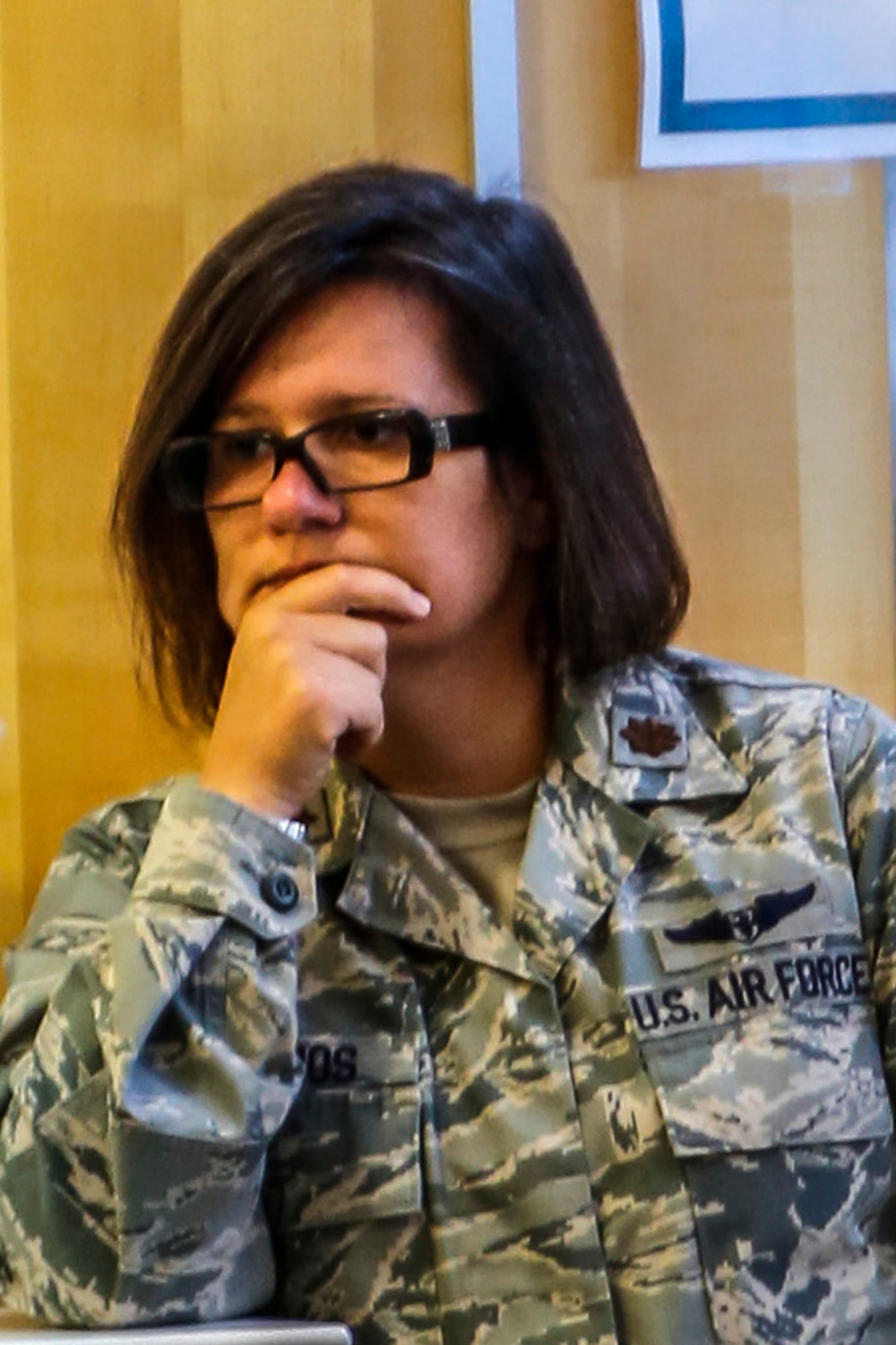 Maj. Anniesa Selimos, 446th Aerospace Medicine Squadron chief of Nursing at McChord Field, Wash., listens to a medical emergency scenario during a mass casualty tabletop exercise. Selimos joined the Air Force Reserve, after being inspired by her brother's enlistment. (U.S. Air Force Reserve photo by Master Sgt. Jake Chappelle)