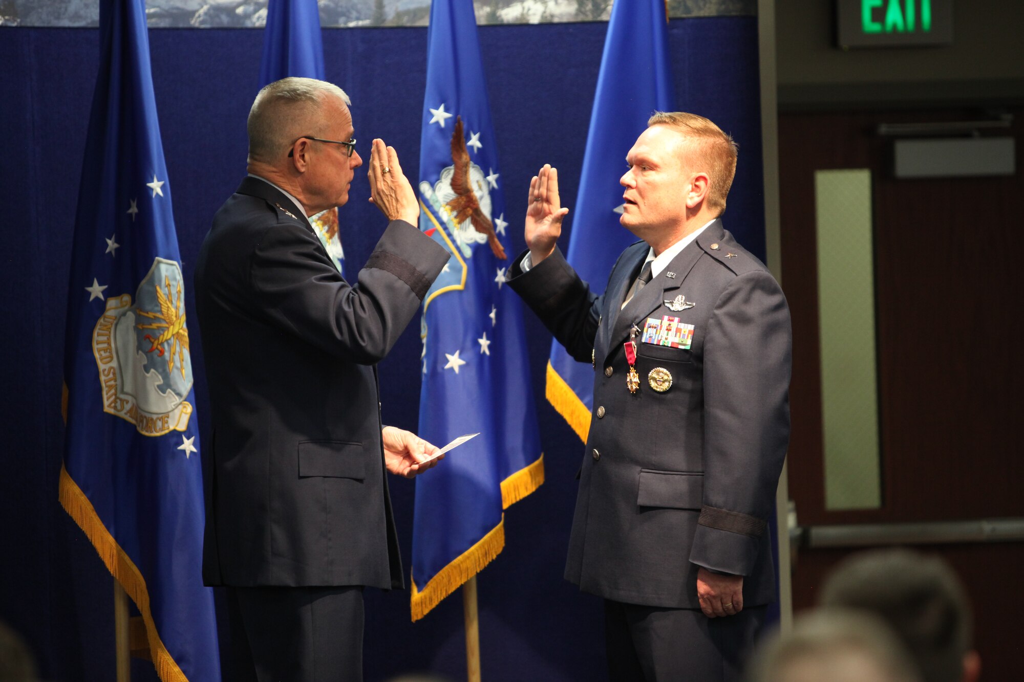 More than 150 people attended a promotion ceremony for Brig. Gen. Samuel Mahaney, Air Reserve Personnel Center commander, Feb. 14, 2014, on Buckley Air Force Base, Colo.. The ceremony was officiated by retired Maj. Gen. John Dorris. Mahaney was commissioned in July 1985 as a graduate of the Air Force Reserve Officer Training Corps at the Missouri University of Science and Technology. He is a command pilot with more than 5,000 flying hours. (U.S. Air Force photo/Tech. Sgt. Rob Hazelett)
