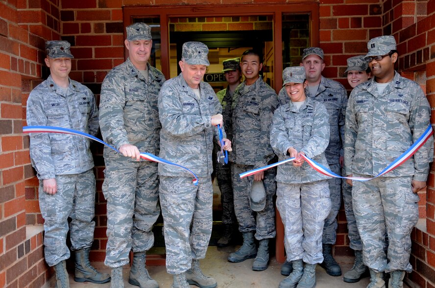 U.S. Air Force Brig. Gen. Glen VanHerck, 7th Bomb Wing commander, cuts a ribbon marking the opening of the Tax Center Feb. 3, 2014, at Dyess Air Force Base, Texas. The 7th Bomb Wing Judge Advocate’s office was recently recognized as the best legal office in Air Combat Command for 2013. (U.S. Air Force photo by Senior Airman Shannon Hall/Released)