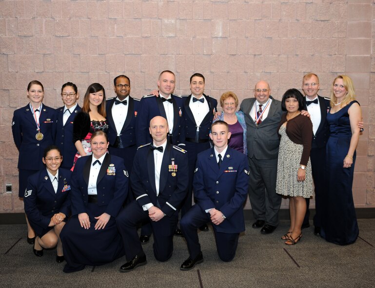 Airmen from the 7th Bomb Wing Staff Judge Advocate’s office pose for a photo on Feb. 7, 2013, at the Abilene Civic Center, in Abilene, Texas. For the second year in a row, the JA was named the best legal office in Air Combat Command. In total, they completed 469 wills, 295 medical directives, and 2,750 powers of attorney, saving clients $467,000 in fees. (U.S. Air Force photo by Airman 1st Class Kedesha Pennant/Released)
