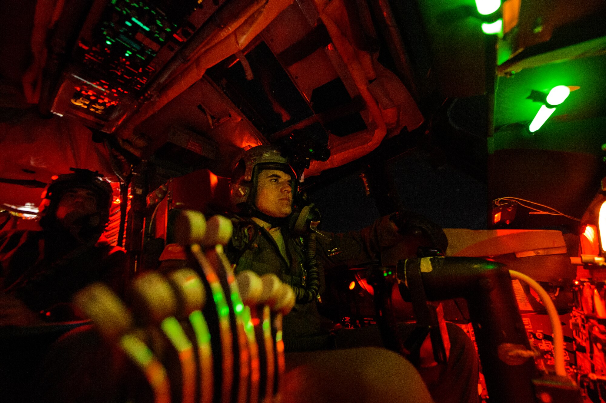 Capt. Austin Fouts, 23rd Bomb Squadron pilot, flies a B-52H Stratofortress over Nevada Feb. 11, 2014. The 23rd BS conducted a live ordnance training mission dropping Cluster Bomb Unit 103 and CBU-87 at the Nevada Test and Training Range. (U.S. Air Force photo by Staff Sgt. Jonathan Snyder/RELEASED)