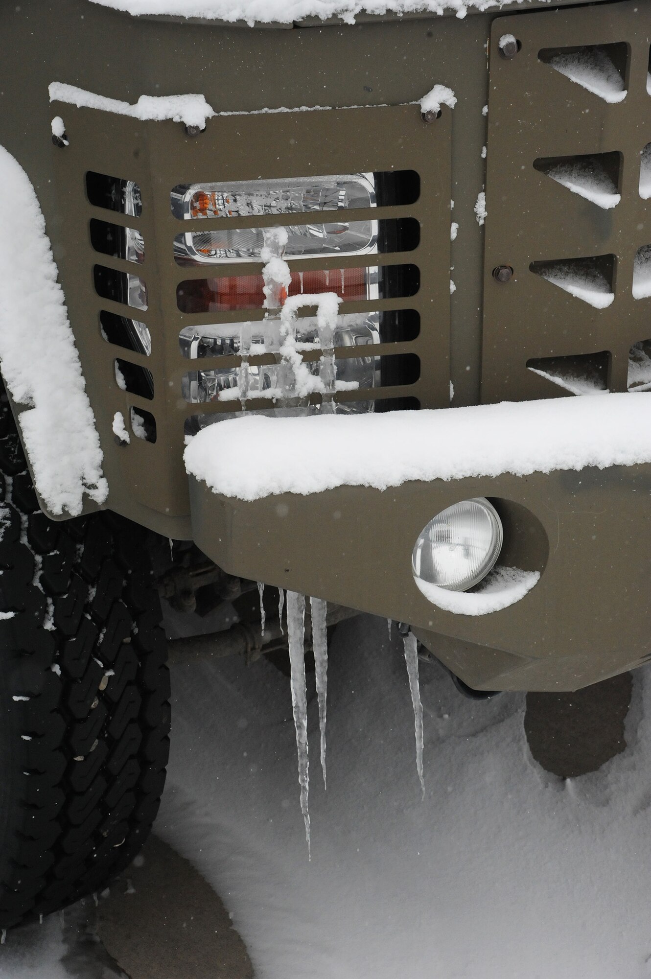 Icicles hang from the fender of one of Malmstrom’s Bearcats. According to members of Malmstrom’s safety office, having an emergency kit – equipped with jumper cables, extra food and water, a flashlight, blankets and other items – is important to keep in all vehicles so that drivers and passengers are prepared for any situation. (U.S. Air Force photo/Senior Airman Cortney Paxton)