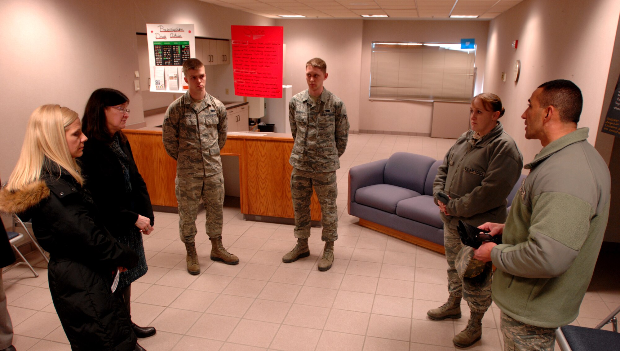 Ricki Selva, spouse of Air Mobility Command Commander Gen. Paul Selva, tours the Tunnel of Oppression Feb. 12, 2014 on Grand Forks Air Force Base, N.D. The Tunnel of Oppression is an interactive sensitivity training tool where visitors enter a building with various rooms devoted to key Air Force resiliency issues, including drug and alcohol abuse, suicide and depression. Mrs. Selva, one of the first women to ever graduate from the Air Force Academy in the class of 1980, focused her visit on the families’ perspective of military service, dignity and respect in the ranks and force restructuring. (U.S. Air Force photo/Staff Sgt. Susan L. Davis)