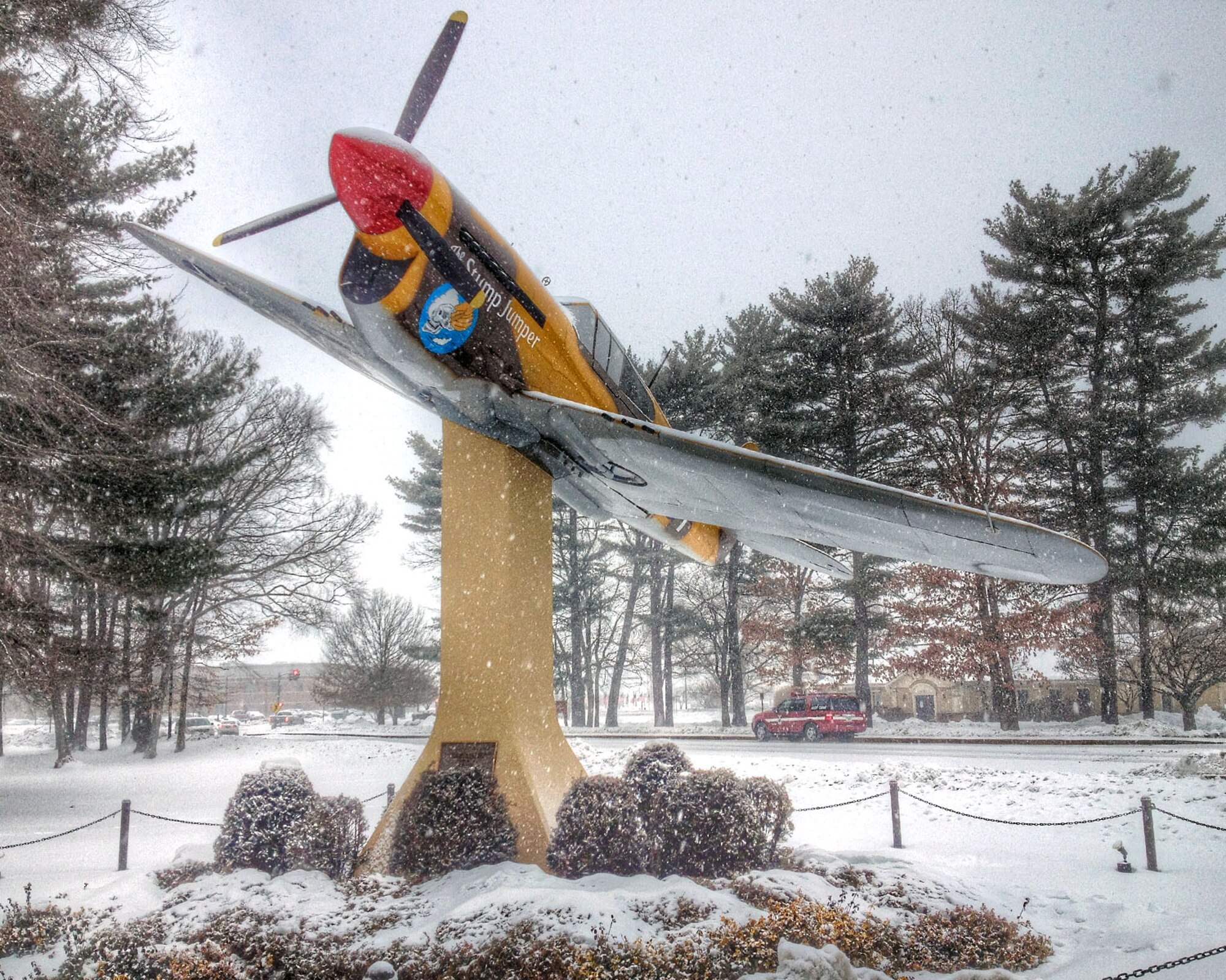 HANSCOM AIR FORCE BASE, Mass. – Snow accumulates around the P-40 on the corner of Vandenberg and Marrett streets Feb. 13. The base and surrounding areas saw several inches of snow this week as a result of the storm. (U.S. Air Force photo by Mark Herlihy)