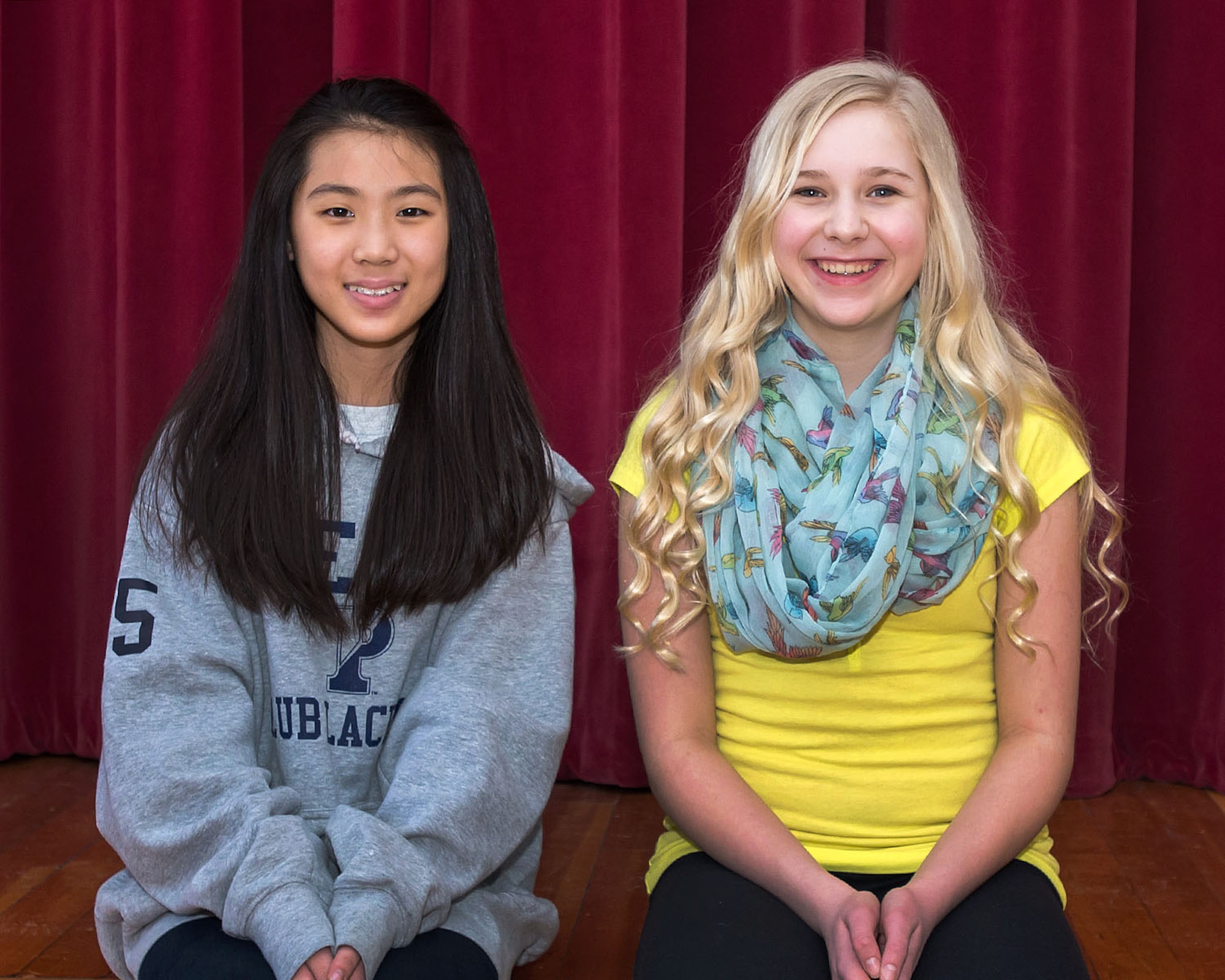 HANSCOM AIR FORCE BASE, Mass. – (left to right) Audrie Lee and Emily McSwain have been selected to participate in the Massachusetts Music Educators Association Eastern District Junior Festival in March. During auditions in January, 1,042 students from eastern Massachusetts performed. Of those, 480 were chosen for the festival. Lee will sing with the Treble Chorus and McSwain will sing with the Mixed Chorus. (U.S. Air Force photo by Rick Berry)