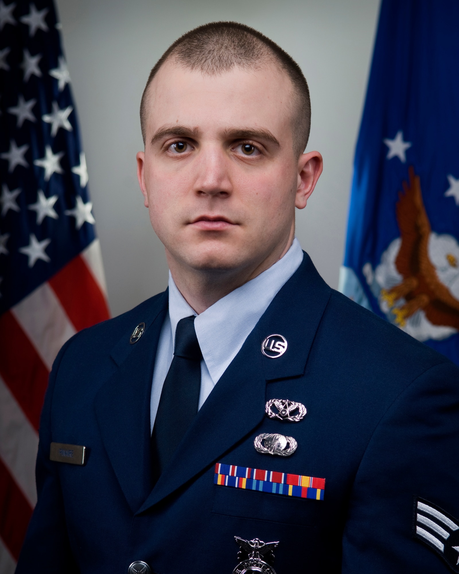 Senior Airman Kenneth W. Pinaire Jr., 434th Civil Engineer Squadron fire protection journeyman, was selected as the 434th Air Refueling Wing Airman of the Year for 2013 at Grissom Air Reserve Base, Ind., Jan. 29, 2014. Pinaire, who joined the Grissom Fire Department in 2012, used his new skills to save multiple lives and equipment during 2013. (U.S. Air Force photo/Tech. Sgt. Mark R. W. Orders-Woempner)
