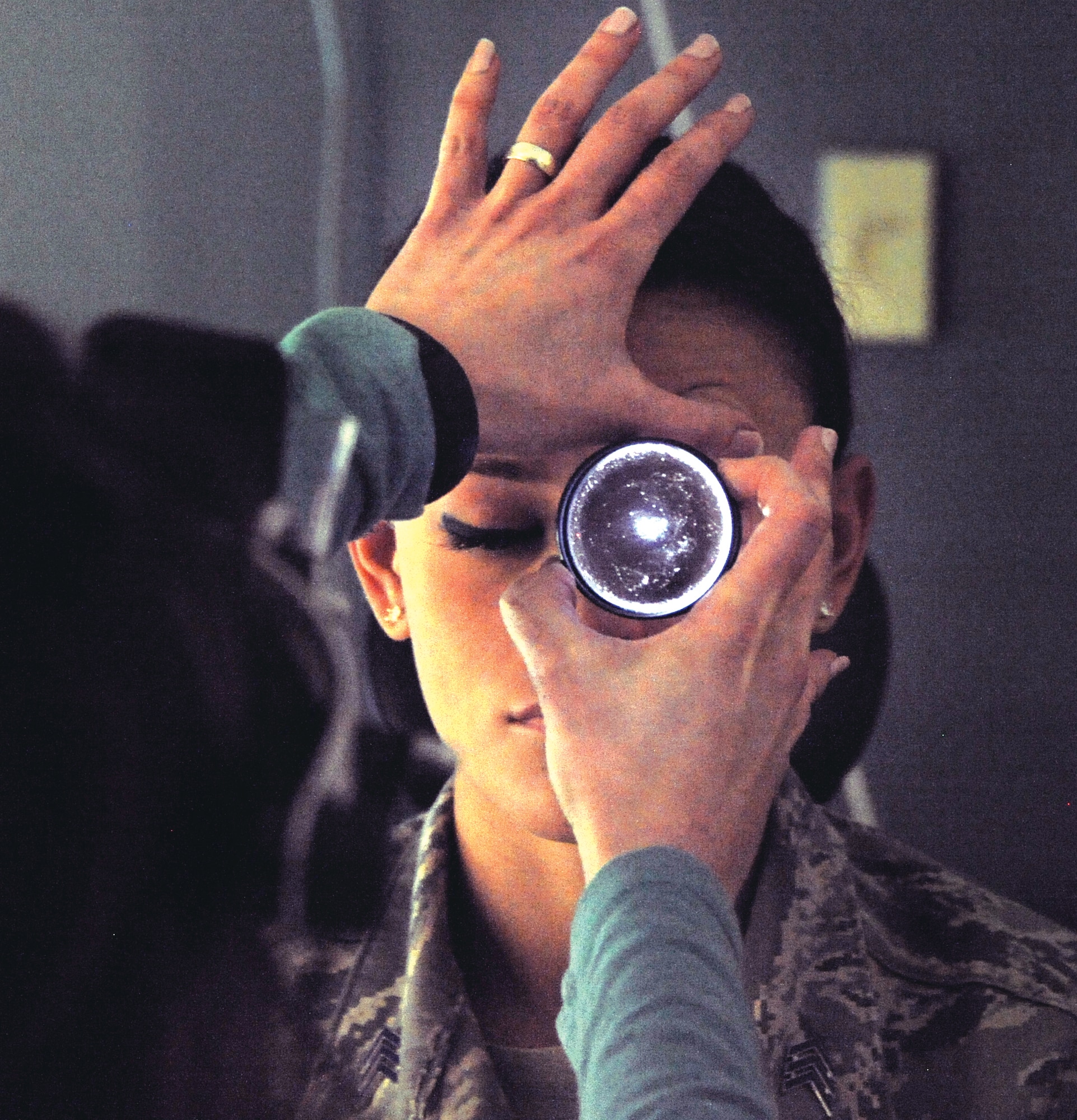 A cadet gets her eyes checked at the Academy's Warfighter Refractive Surgery Center Feb. 11. (U.S. Air Force Photo/Carol Lawrence)