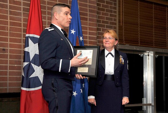 Arnold Engineering Development Complex (AEDC) leadership honored annual award winners at the Complex’s recent Annual Awards Banquet. Retired U.S. Air Force Chief Master Sgt. Terry Hood (right), the AEDC Communications Branch, Information Technology Resource manager, was the keynote speaker. AEDC Commander Col. Raymond Toth presented Hood with the guest speaker appreciation memento and she also received the AEDC Annual Awards Banquet Spirit Award. (Photos by Jacqueline Cowan)