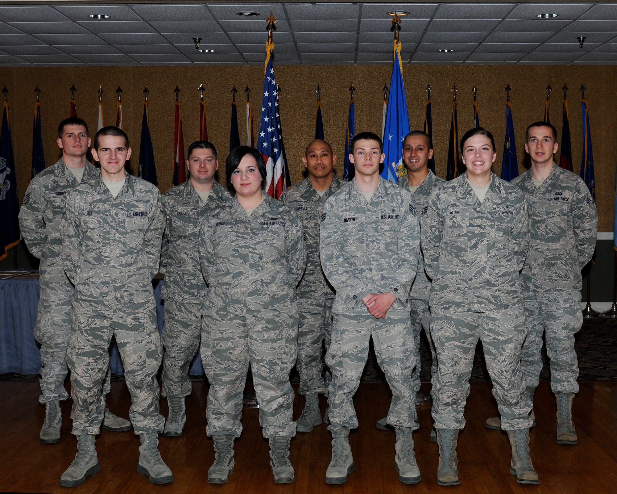 Nine of Team BLAZE’s newly promoted enlisted Airmen sewed on their next stripe at the enlisted promotions ceremony at the Columbus Club on Jan. 31. (U.S. Air Force photo/Melissa Doublin)