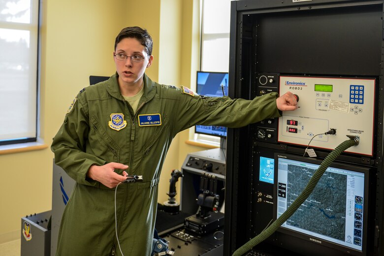 Capt. Julianne Gillespie, 62nd Airlift Wing aerospace and operational physiologist, validates how she can monitor an aircrew member’s pulse and oxygen saturation in their blood while being tested with the Reduced Oxygen Breathing Device at the McChord Field clinic, Feb. 5, 2014 at Joint Base Lewis-McChord, Wash. The ROBD allows aircrew members to experience hypoxia while flying. (U.S. Air Force photo/Tech. Sgt. Sean Tobin)