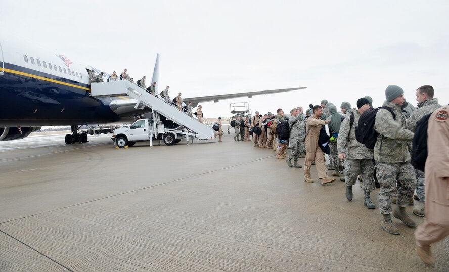 Approximately 150 Airmen with the 552nd Air Control Wing returned to Tinker Feb. 6 from a six-month deployment to Southwest Asia in support of Operation Enduring Freedom. The Airmen were greeted by base leadership and their co-workers, families and friends. (Air Force photo by Kelly White)