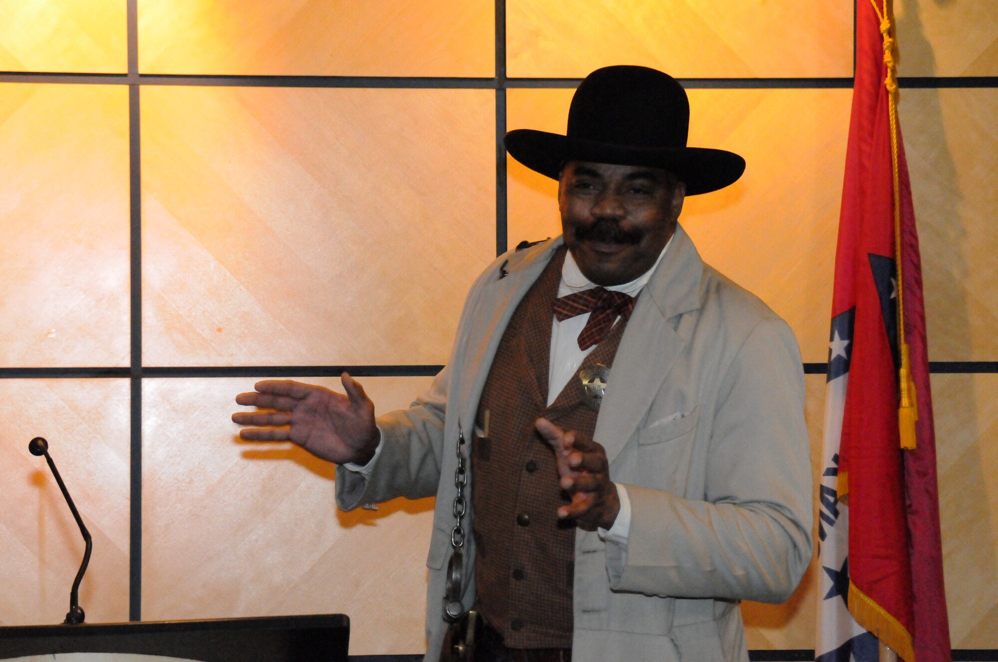 Baridi Nkokheli, City of Fort Smith director of sanitation, conducts a Bass Reeves presentation at a Black History Month event held at the 188th Fighter Wing headquarters auditorium Feb. 9, 2014. Because of his resemblance to the former U.S. Marshal and Van Buren, Ark., native Reeves, Nkokheli often re-enacts the character of Reeves in presentations around the area. (U.S. Air National Guard photo by Airman 1st Class Cody Martin) 