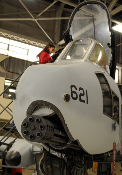 Students with Fort Smith (Ark.) Sutton Elementary School get a view of the inside of an A-10C Thunderbolt II “Warthog” cockpit during a tour of the 188th Fighter Wing’s Ebbing Air National Guard Base Jan. 29, 2014, as part of the Fort Smith School District’s Partners in Education program. The 188th has been Sutton’s partner for more than 20 years. Sutton toured the 188th’s hangar, fire station and Security Forces Squadron during its visit. The group also had lunch in the 188th’s Citizen Airmen Dining Hall. (U.S. Air National Guard photo by Maj. Heath Allen)